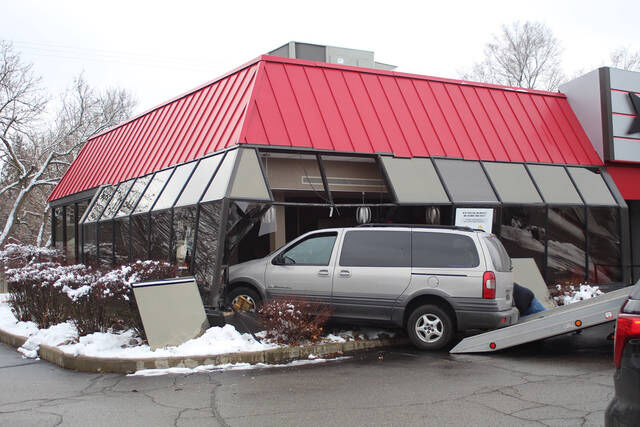 VAN CRASHES INTO RESTAURANT